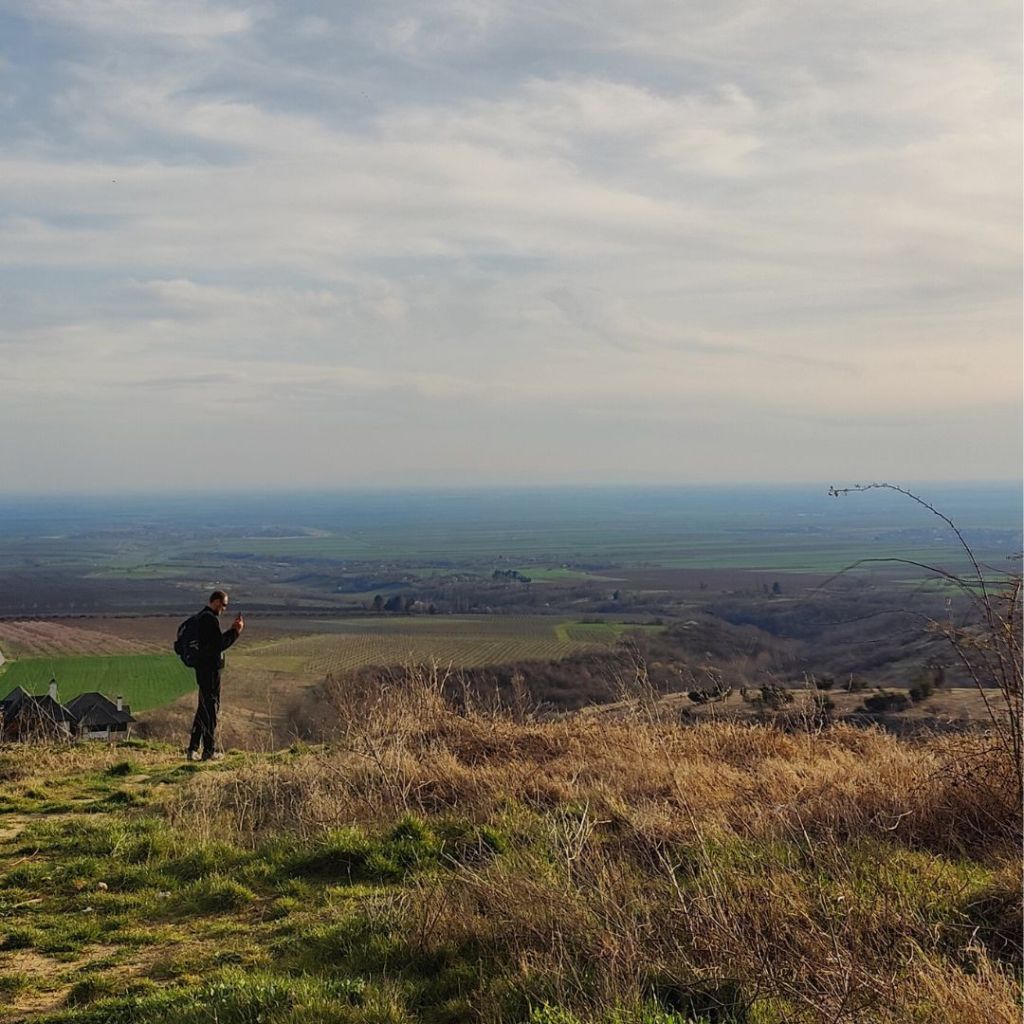 Tourist makes a photo of the landscape in Fruska Gora National Park in Serbia