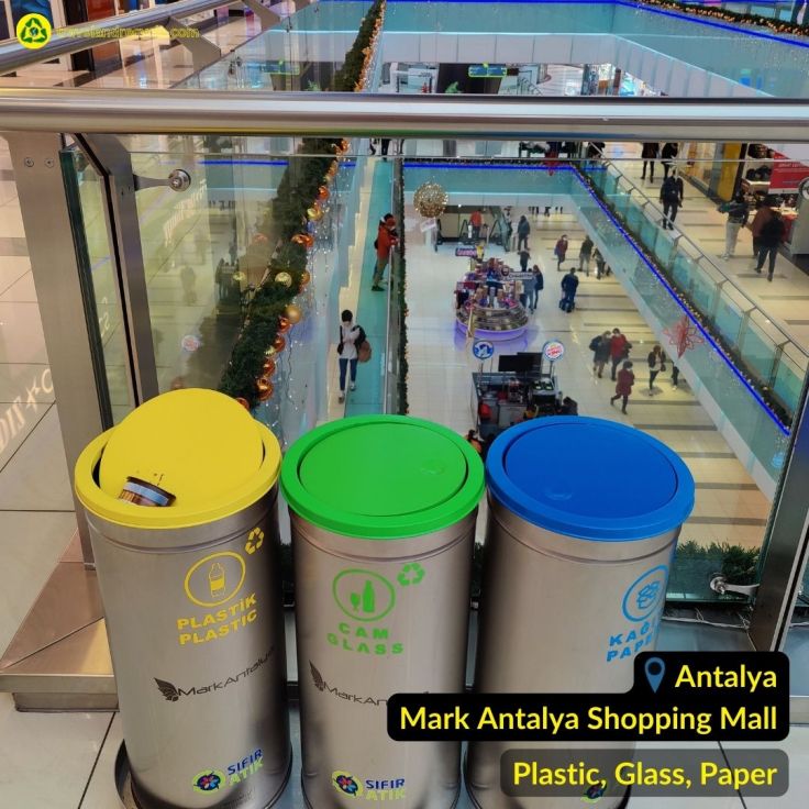 Gray metal ecycling bin for paper, plastic and glass waste in Mark Antalya Shopping mall in Antalya Turkey