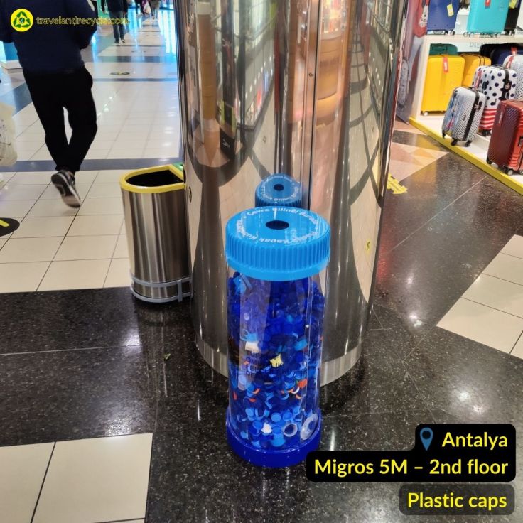 Blue recycling bin for plastic caps in Antalya Migros 5M shopping mall Turkey
