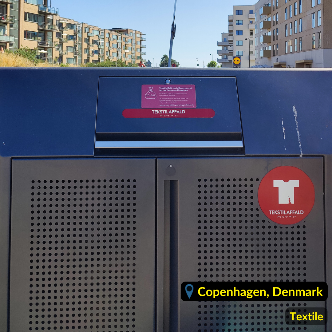 Grey waste bin for Textile marked with red label in Copenhagen Denmark